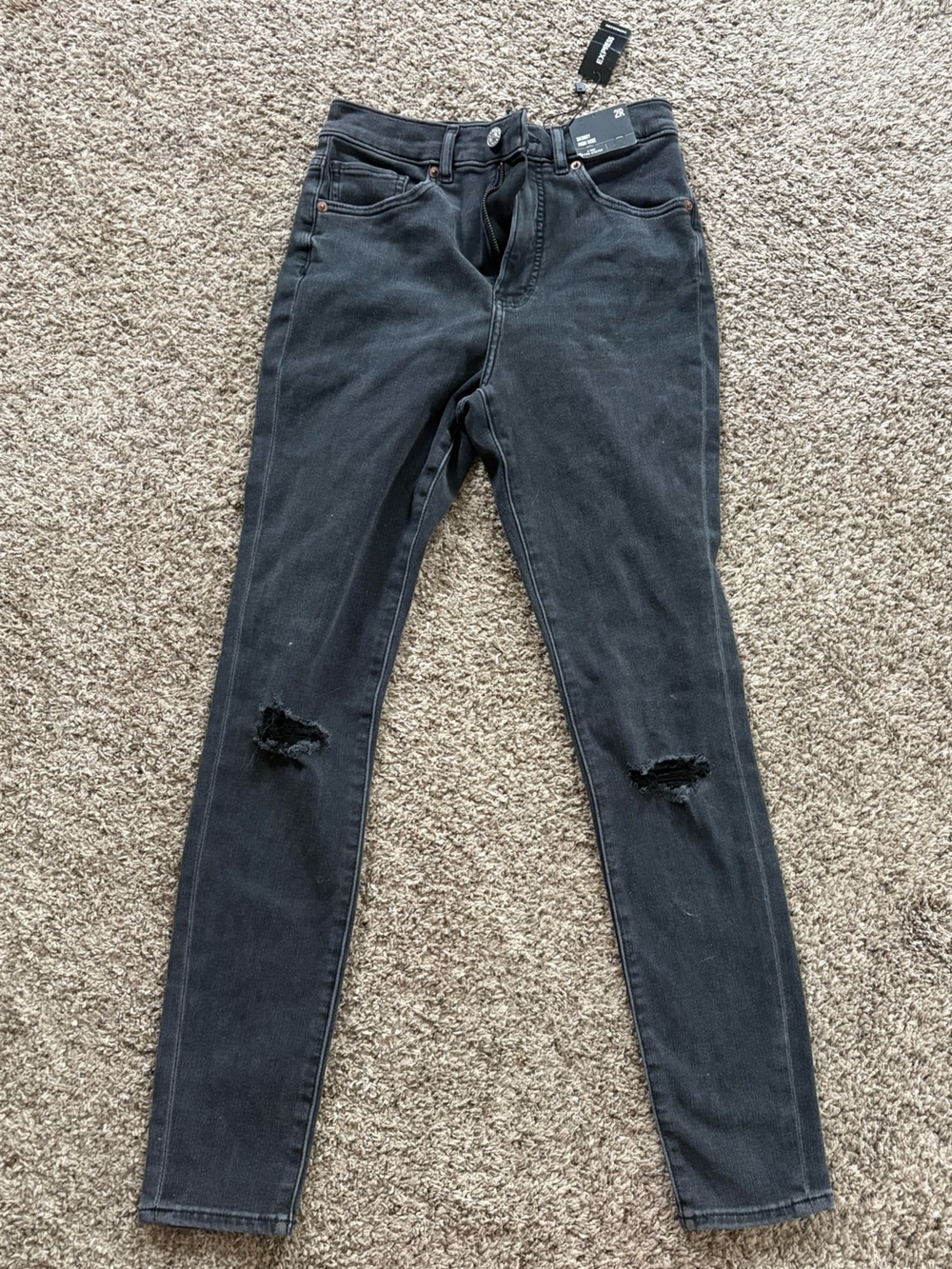 Express Women's Black Skinny Jeans with Knee Rips